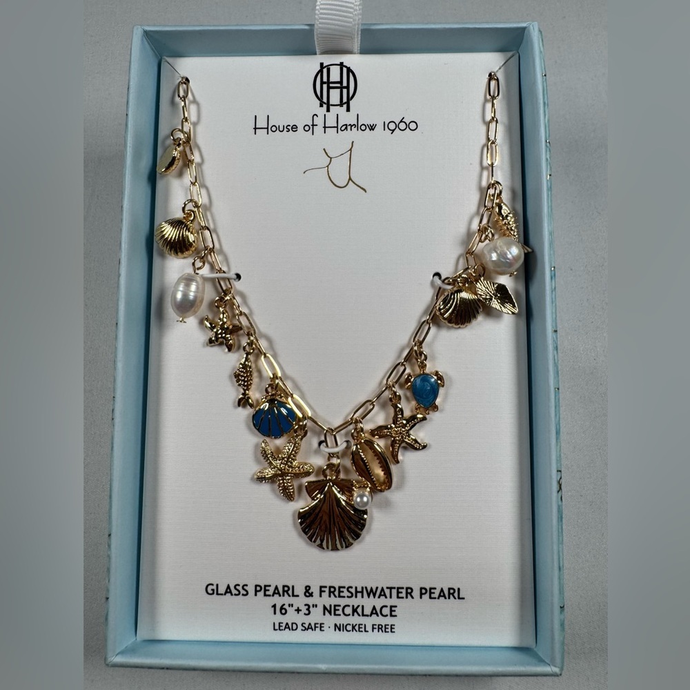 NIB House of Harlow 1960 Gold and Blue Charm Necklace. Sea charms